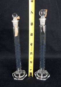 lot 131 image: Set of 4 Mercer Glass Works Merco 10 ML Graduated Mixing Cylinders With Stoppers