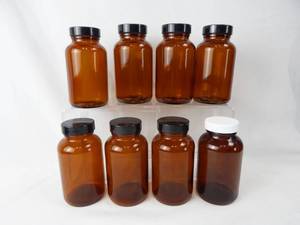 lot 163 image: Set of 8 Vintage 8 Ounce Amber Glass Bottles