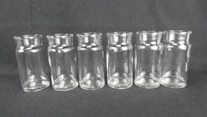lot 214 image: Set of 6 Vintage T.C.W. Co. Glass 4 Ounce Gas Washing Bottles