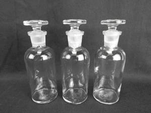 lot 221 image: Set of 3 Vintage Wheaton Glass Company 125 ML Narrow Mouth Glass Bottles With Stoppers