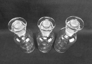 lot 223 image: Set of 3 Vintage Wheaton Glass Company 125 ML Narrow Mouth Glass Bottles With Stoppers