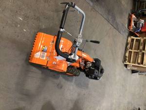 lot 34 image: 18 in. 208cc Dual Rotating Rear Tine Tiller Briggs and Stratton by YARDMAX Customer Returns See Pictures
