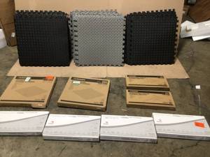 lot 37 image: Lot of assorted matts and flooring Trim Kits Customer Returns See Pictures