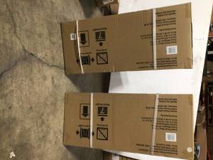 lot 10 image: Lot of 2 Ready-to-Assemble 24-Gauge Steel Wall Mounted Garage Cabinet in Black (28 in. W x 29 in. H x 12 in. D) by Husky Customer Returns See Pictures