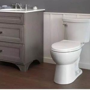 lot 9 image: Turner 2-piece 1.28 GPF Single Flush Elongated Toilet in White the retail price is $159.00