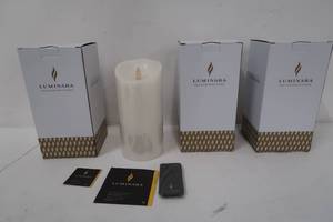 lot 645 image: Luminara Real-Flame Effect 7-Inch Pillar Candle in Ivory - 4 Pack