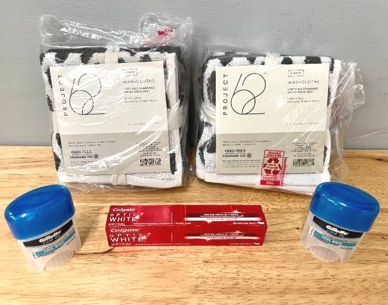 lot 88 image: Lot of Bathroom Items-Washcloths Deodorant and Toothpaste.