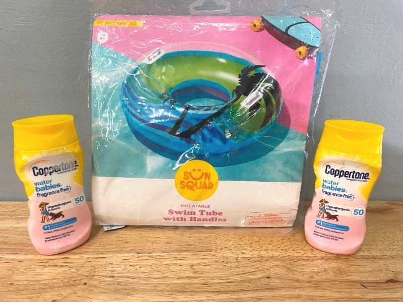 lot 64 image: Lot of Sunscreen and Swimming Pool Tube with Handles. 