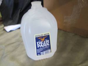 lot 11 image: 5 Gallons Deer Park Distilled Water...