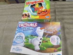 lot 131 image: Frozen Trouble Game, Hungry Hippos ...
