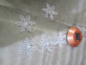lot 229 image: Solar Powered Winter Mobile...