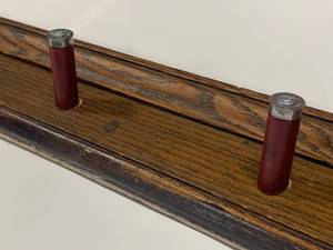 lot 16 image: Window Base Shotgun Shell Peg Rack 48 Long