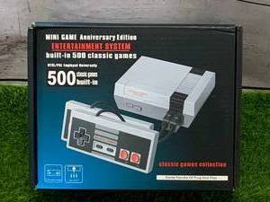 lot 66 image: Mini Entertainment Game System with 500 Games (new in box)