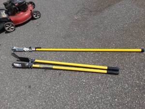 lot 26 image: Craftsman Telescoping Pole Saw & Seymore 6 Post Hole Digger