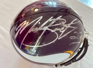 lot 165 image: Autographed Riddell Vikings Helmet by Michael Bennett