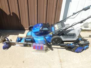 lot 10 image: Kobalt self propelled 40 volt lawn mower, weed trimmer & blower. Includes 1 battery & charger. Tested & works. As shown.