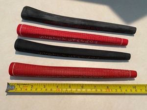 lot 41 image: Four Scotty Cameron Putter Grips