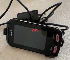 lot 249 image: Garmin Approach G8 with charging cord
