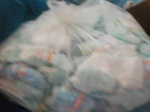 Bag of 100 or so Diapers newborn - ...