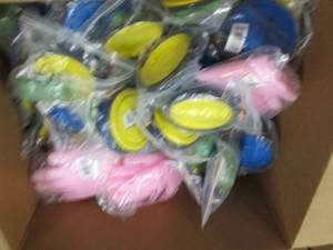 box of dog bowls and grooming glove...