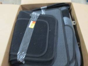 box of car floor mats ...