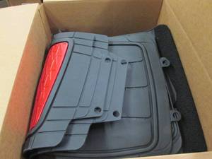 box of floor mats ...