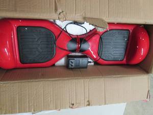 red hoverboard powerrs on ...