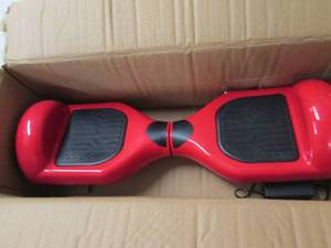red hoverboard powerrs on ...