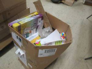 box of printer paper and lcd magnif...