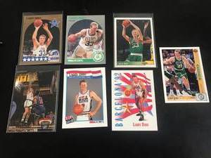 lot 53 image: 7 Different Larry Bird Cards