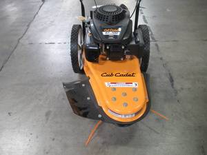 lot 21 image: Cub Cadet 22 in. 159cc Gas Walk Behind String Trimmer Mower ST 100