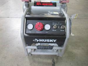 lot 47 image: Husky 4.5 Gal. Portable Electric-Powered Silent Air Compressor 3320445