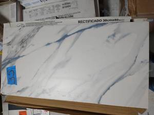 lot 35 image: IVY HILL Calacatta Indigo 12 in. x 24 in. Matte Porcelain Floor and Wall Tile (6 pieces11.62 sq. ft.Case)
