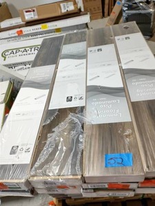 lot 52 image: TRAFFIC MASTERS Lakeshore Pecan Heather 7 mm Thick x 7-23 in. Wide x 50-58 in. Length Laminate Flooring (24.17 sq. ft.  case)