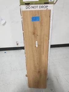 lot 62 image: 9 CAP A TREAD Essential Oak 47 in. L x 12-18 in. W x 1-1116 in. T Vinyl Overlay to Cover Stairs 1 in. Thick