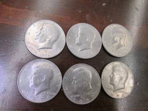 Half Dollars See Photos...