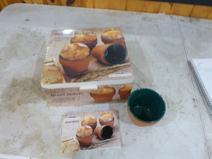 lot 55 image: Set of 4 Hearthstone Bread Bakers