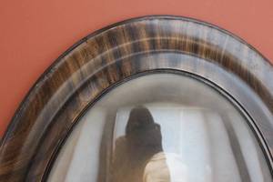 lot 120 image: Oval framed bubble glass portrait