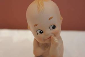 lot 122 image: Kewpie doll, Mini German doll