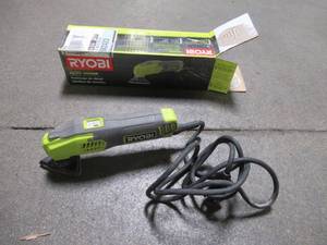 lot 12 image: Ryobi 0.4 Amp Corded 2-78 in. Detail Sander, DS1200 - Used.