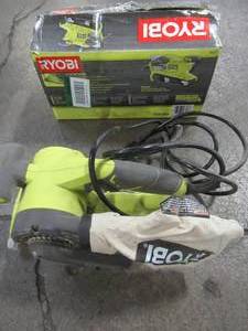 lot 29 image: RYOBI 3 in. x 18 in. Portable Belt Sander, BE319 - Used.