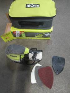 lot 32 image: RYOBI 1.2 Amp Corner Cat Sander, CFS1503GK, Used.