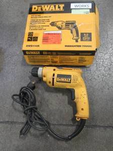 lot 67 image: DEWALT 38 in. Pistol Grip Drill Kit, DWD110K - Used.