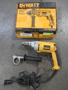 lot 76 image: Dewalt 7.8 Amp 12 in. Variable Speed Reversing Drill, DW235G - USED.