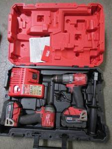 lot 87 image: Milwaukee M18 FUEL 18-Volt Lithium-Ion Brushless Cordless Hammer Drill & Impact Driver Combo Kit (2-Tool) w(2) 5Ah Batteries, 2997-22. - Used.