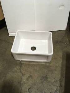 lot 13 image: Delice Farmhouse Kitchen Sink Ceramic Composite 24 in. x 18 in. Single Bowl in White by Swiss Madison Customer Returns See Pictures