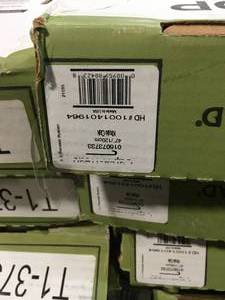 lot 31 image: 12 cases of Khaki Oak 47 in. Length x 12-18 in. Deep x 1-1116 in. Height Vinyl Overlay to Cover Stairs 1 in. Thick by Cap A Tread Customer Returns See Pictures