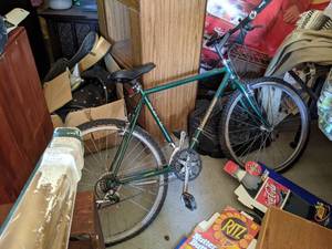 Unit 14 - Gaylord Mini Storage 10 x 22 Unit full of Racing Memorabilia, Home Decor, a Mens Bicycle, and More