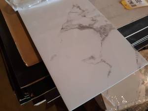 Lot of 70 Sq. Ft. Statuario Porcelain Tiles