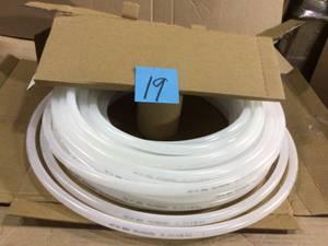 lot 19 image: 58 in. O.D. x 12 in. I.D. x 100 ft. Natural Polyethylene Tubing with Dispenser Box Customer Return See Pictures